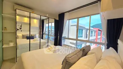 Modern bedroom with large windows and mountain view in a stylish apartment