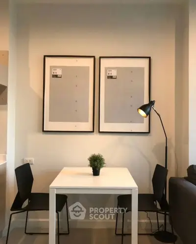 Modern dining nook with minimalist decor and stylish lighting