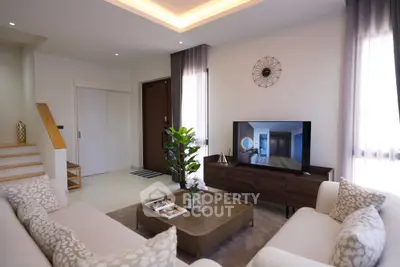 Luxurious modern living room with elegant decor and natural light
