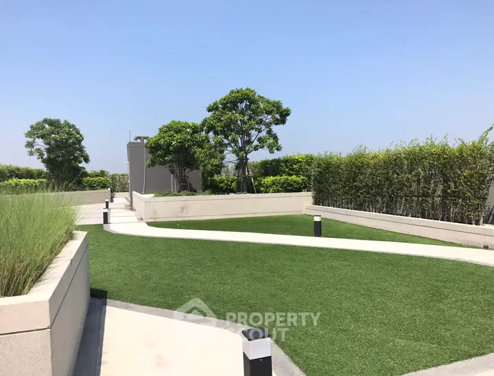 Luxurious rooftop garden with lush greenery and modern design