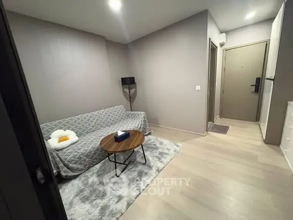 Cozy modern living room with stylish decor and soft lighting