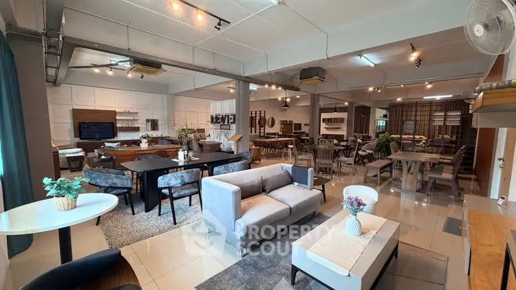 Spacious modern living room with stylish furniture and open layout