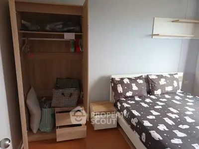 Cozy bedroom with cute bear-themed bedding and open wardrobe