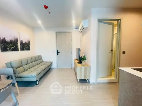 Modern living room with sleek furniture and minimalist design