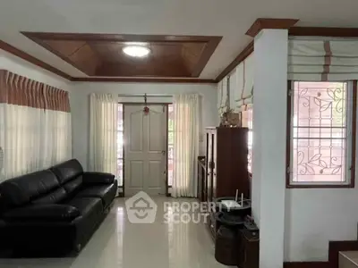 Spacious living room with elegant decor and natural light