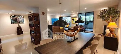 Spacious modern living and dining area with elegant decor and open layout.