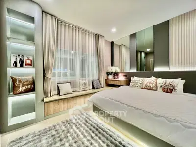 Luxurious modern bedroom with elegant decor and ambient lighting