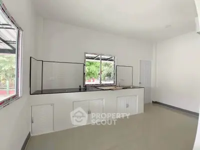 Spacious kitchen with modern design and ample natural light