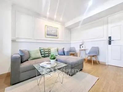 Modern living room with stylish decor and cozy seating area