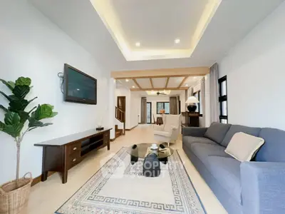 Spacious modern living room with elegant decor and cozy seating area