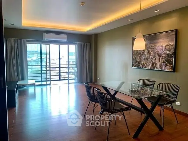 Spacious modern dining area with city view and elegant lighting