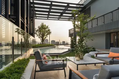 Luxurious rooftop terrace with modern seating and stunning city views