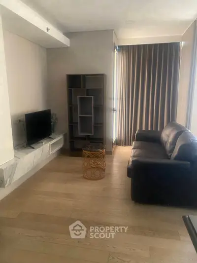 Modern living room with sleek furniture and natural light