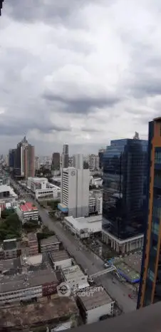 Stunning cityscape view from high-rise building balcony