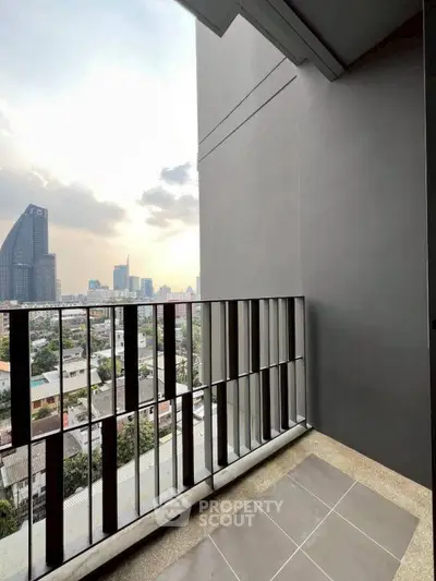 Modern balcony with city view in high-rise apartment