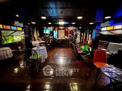 Charming rustic interior with wooden floors and eclectic decor, perfect for cozy gatherings.