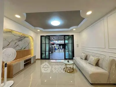 Modern living room with elegant ceiling design and stylish furniture