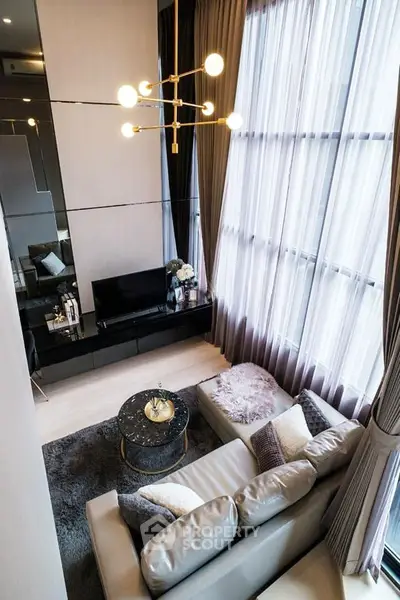 Luxurious modern living room with high ceilings and elegant decor