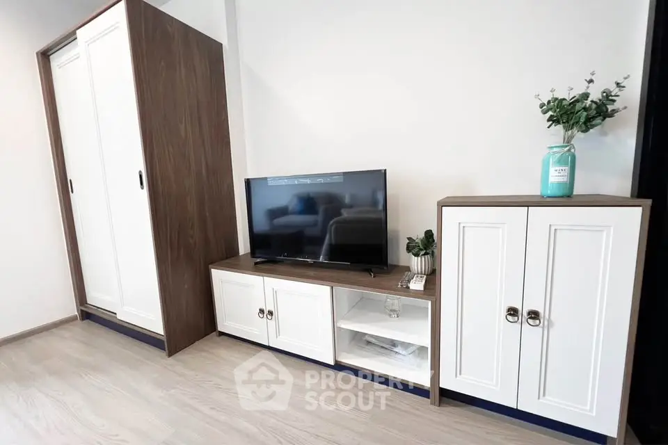 Modern living room with sleek TV cabinet and stylish storage solutions