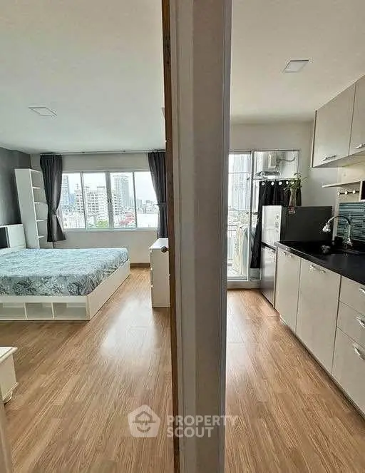 Modern studio apartment with open layout and city view