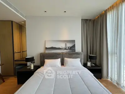 Modern bedroom with large window and stylish decor in luxury apartment