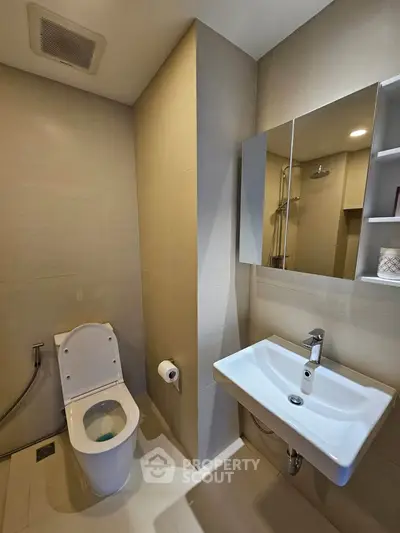Modern bathroom with sleek fixtures and neutral tones