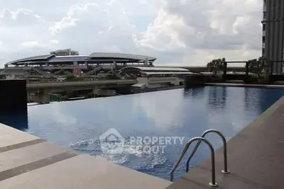 Luxurious rooftop infinity pool with stunning cityscape view