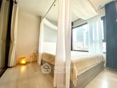 Luxurious bedroom with canopy bed and city view, perfect for urban living.