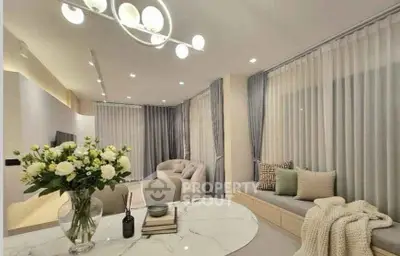 Elegant living room with modern decor and cozy seating area