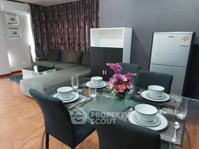 Stylish living room with dining area, modern furniture, and elegant decor