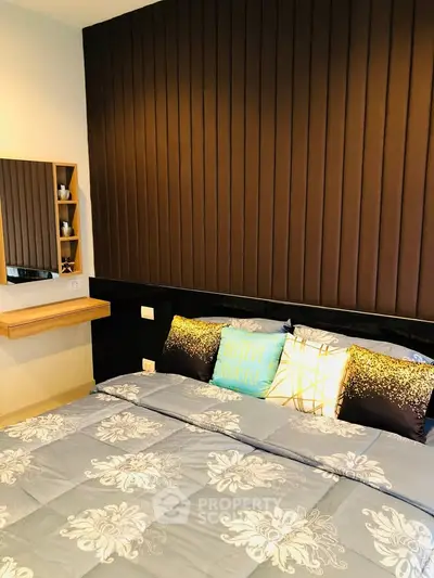 Luxurious bedroom with elegant decor and plush bedding in modern apartment