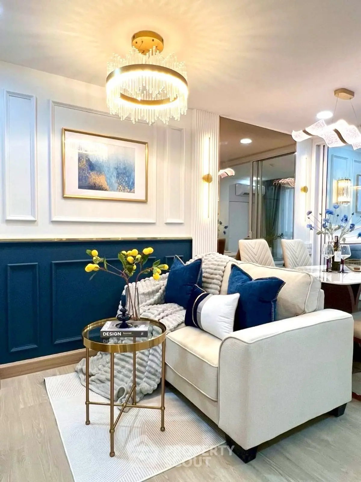 Elegant living room with modern chandelier and stylish decor