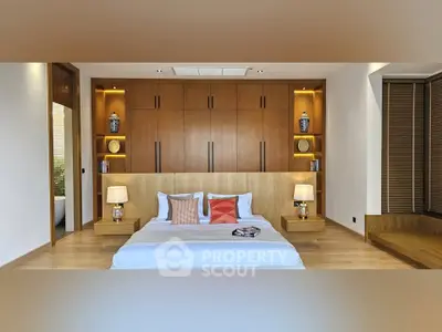 Luxurious bedroom with elegant wooden accents and ambient lighting