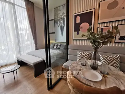 Stylish modern studio apartment with elegant decor and city view