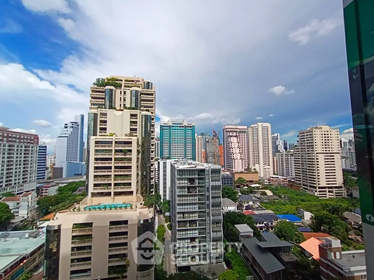 Stunning cityscape view showcasing modern high-rise buildings and lush greenery, perfect for urban living.