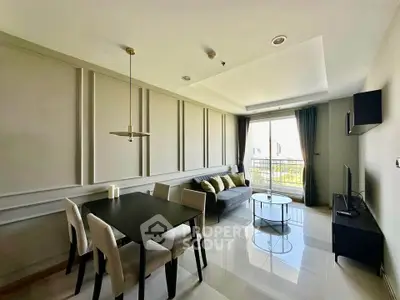 Modern living room with elegant dining area and large window view