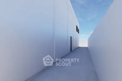 Modern minimalist building exterior with clean lines and bright sky