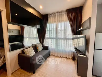 Modern living room with sleek design, large window, and stylish furniture in a high-rise apartment.