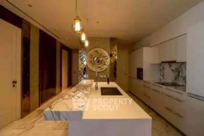 Luxurious modern kitchen with marble countertops and sleek cabinetry