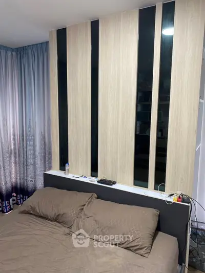 Cozy bedroom with modern decor and stylish paneling
