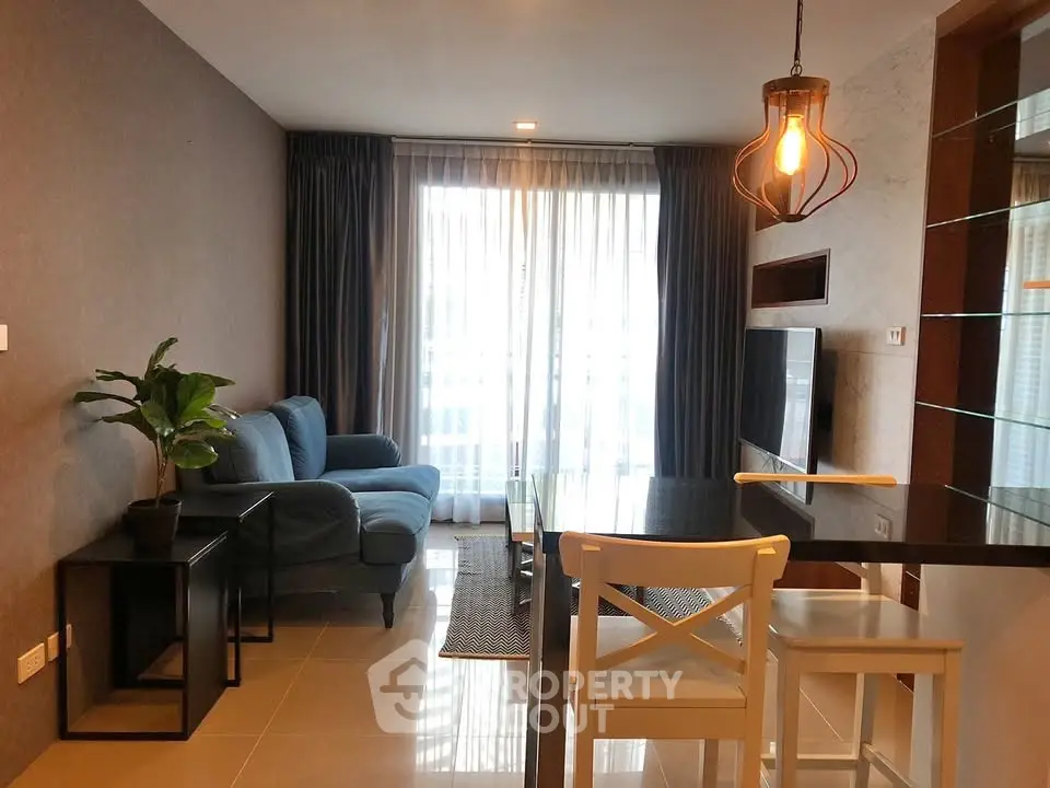 Modern living room with stylish furniture and natural light