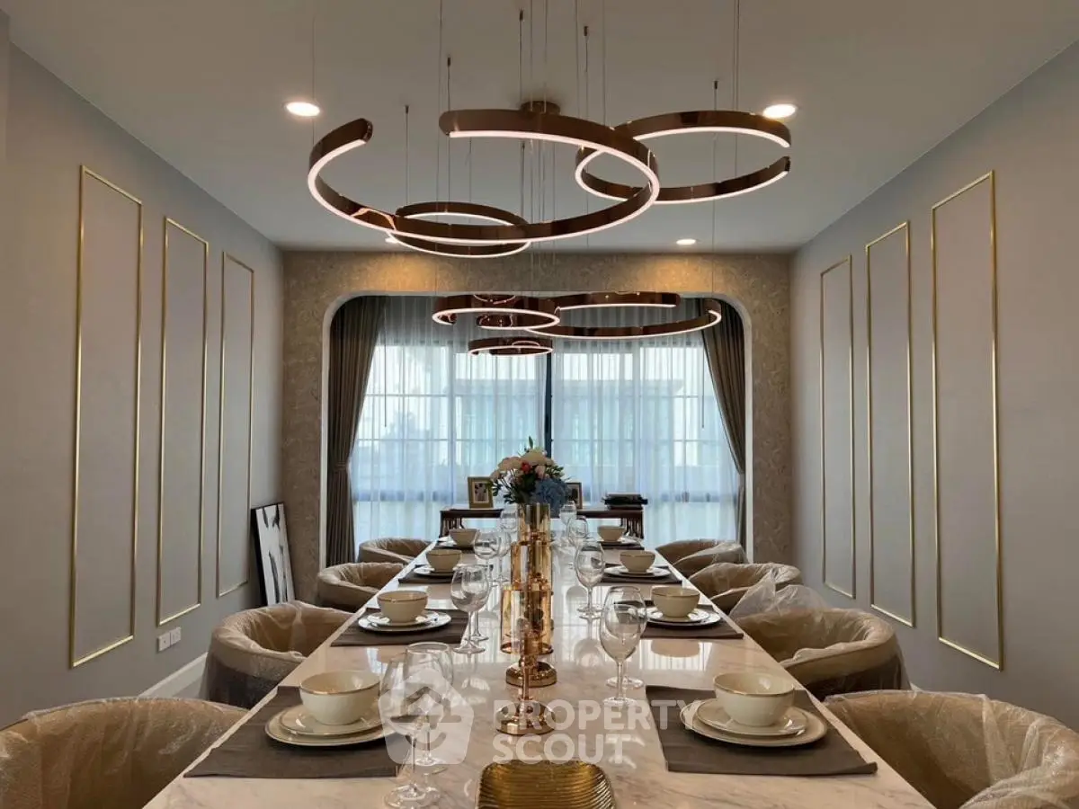 Luxurious dining room with elegant lighting and modern decor