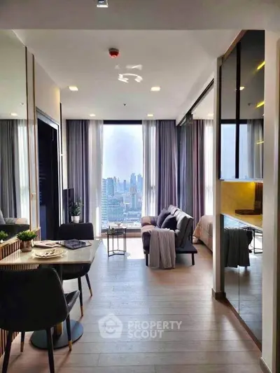 Modern living room with city view, stylish decor, and open layout in luxury apartment.