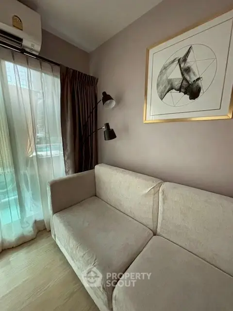 Cozy living room with modern decor and natural light