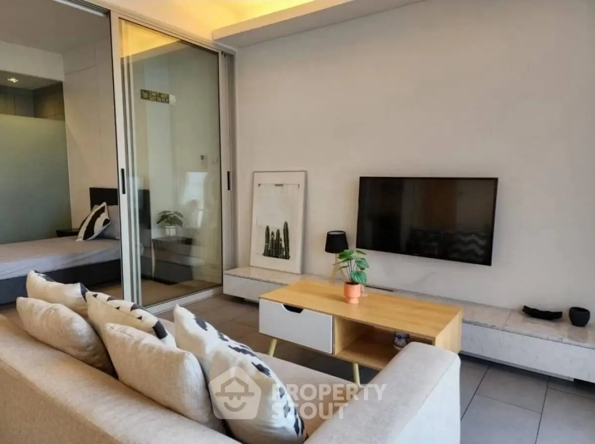 Modern living room with sleek design and cozy ambiance