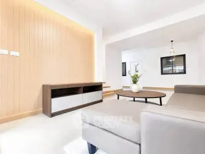 Spacious modern living room with stylish furniture and elegant decor