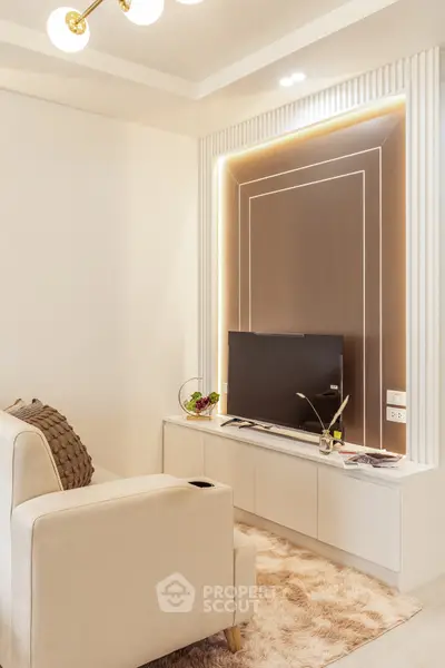 Modern living room with stylish TV setup and cozy decor