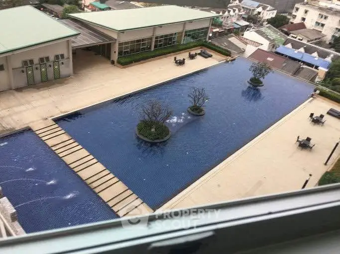 Stunning rooftop pool with modern design and city views, perfect for relaxation and leisure.