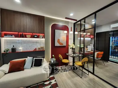 Modern living room with stylish decor and open dining area, featuring contemporary furniture and vibrant accents.