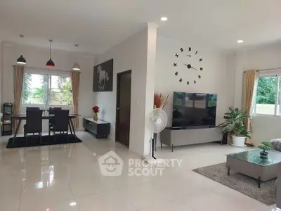 Spacious modern living room with dining area and stylish decor